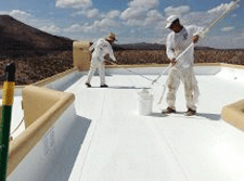 Applying Elastomeric Roof coating in Las Cruces