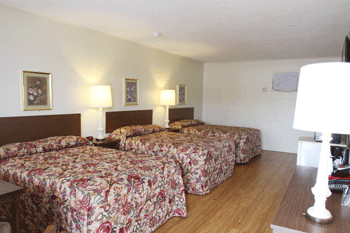 Motel room in Las Cruces with 3 beds